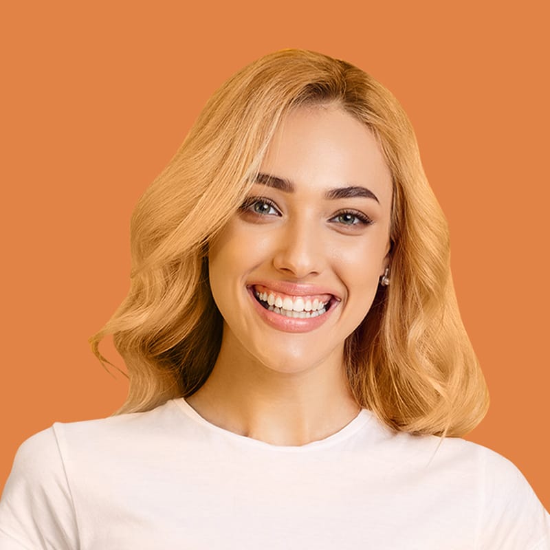 Smiling woman with blonde hair wearing a white shirt, representing the friendly and professional service of Exit Cleans, a New Zealand cleaning company.
